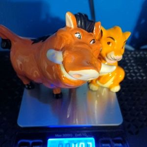 Lion king simba and pumba salt and pepper shakers.